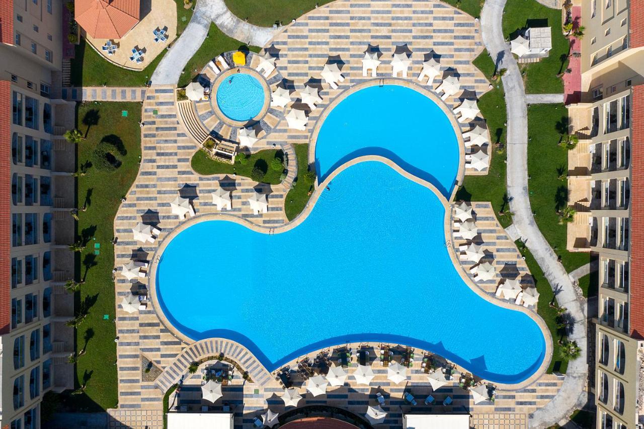 Rixos Alamein - Full Board Plus Эль-Аламейн Экстерьер фото Aerial view of the pool