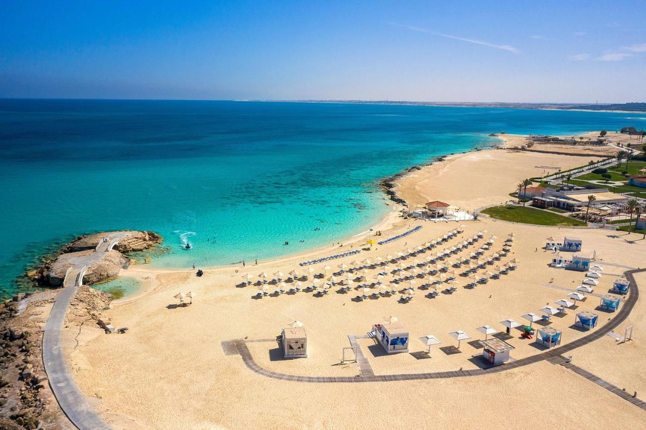 Rixos Alamein - Full Board Plus Эль-Аламейн Экстерьер фото Aerial view of the beach