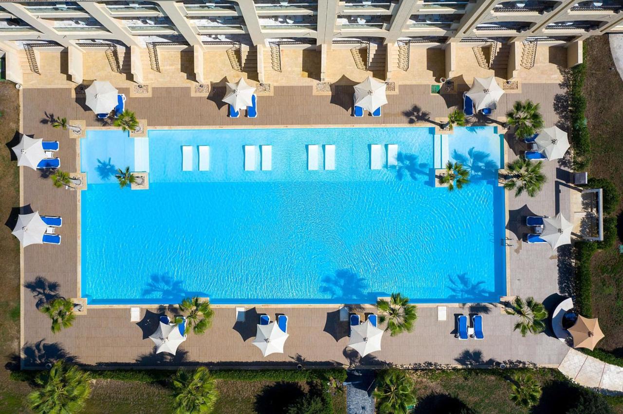 Rixos Alamein - Full Board Plus Эль-Аламейн Экстерьер фото Aerial view of the pool at the Hilton Mauritius Resort